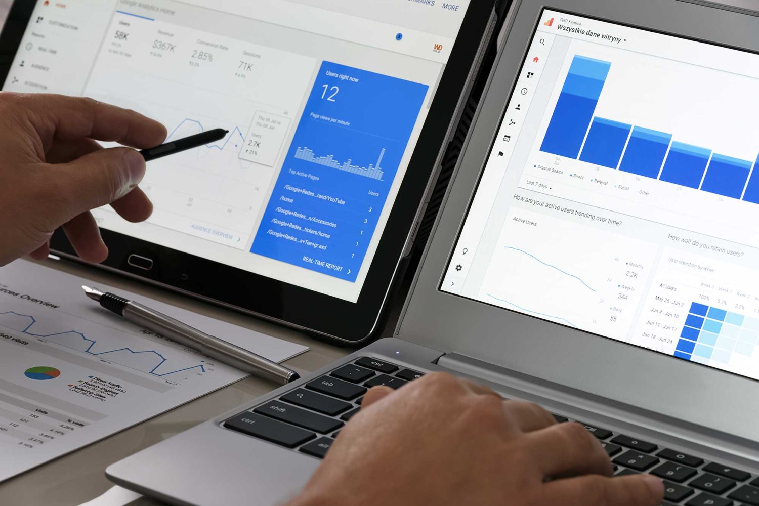 modern-technology-concept-web-traffic-analytics-office-touch-screen-notebook